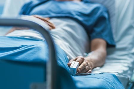 Lack of beds halting  operations, surgeons warn